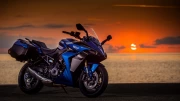 Sunset Freedom: Suzuki GSX S1000GT in front of Sports Motobike