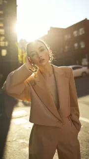 Sunset Elegance: Stylish Silhouette in the Rays of the Sun