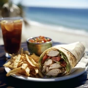 Burrito by the Sea: A Mouthwatering Photo with Golden Potatoes