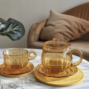 Sophisticated Comfort: Glass Tea Set with Lemon Tart