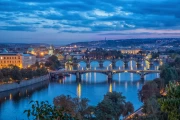 Evening Lights of Prague: Silhouettes of Bridges and Towers