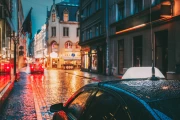 Evening Rain: Lights and Reflections on the City Streets