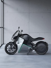 Motorcycle Evolution: Erik Buell and Fuell in Front of a Concrete Wall