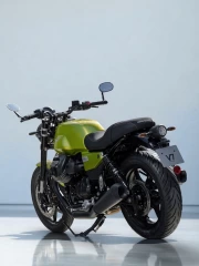 The elegance of the MotoGuzzi V7 Sport against a minimalist backdrop