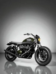 Freedom and Speed: Triumph Bonneville Custom on Gray Background