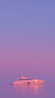 Purple Twilight: Yacht in Freedom Flight