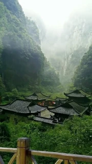 China's Misty Valley: Harmony of Traditional Rooftops