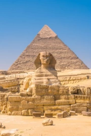 The Grandeur of Egypt: Pyramids and Sphinx in the Desert Sun
