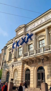 Finland: Architectural Elegy with Waving Flags
