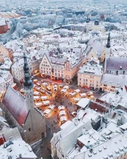 Winter Tales of Lithuania: Snowy Roofs and Coziness