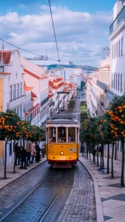 Yellow Tram on the Streets of Portugal: A Colourful Landscape