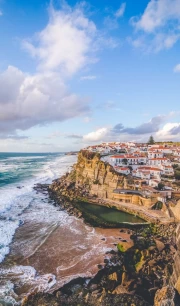 The Charm of the Portuguese Coast: Sea Waves and Picturesque Houses