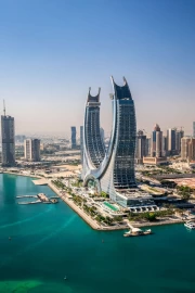 Futuristic Landscape of Qatar: Skyscrapers and Turquoise Waters