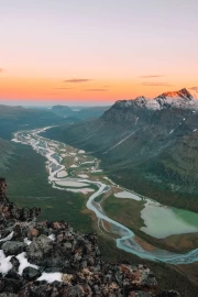 Sweden's Sunset Symphony: Pink Rivers and Mountains