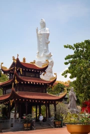 The Grandeur of Vietnamese Temple: Statue and Nature