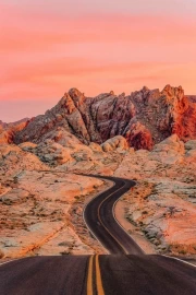 Endless Nevada Roads Under Pink Sunset: Travels Across the USA
