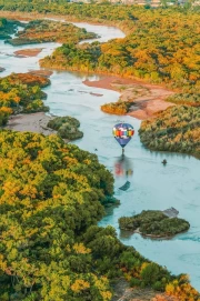 Hot Air Balloon Over the River: The Vast Expanse of New Mexico