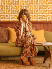 Retro 70s Flower Symphony: The Coziness and Style of the Era