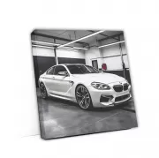 White BMW M6 Parked in Garage - Sporty Elegance