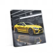 Striking Yellow BMW M8 Parked in Garage - Luxury Redefined