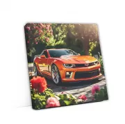 Vibrant Orange Chevrolet Corvette in Blooming Garden: Speed Meets Elegance