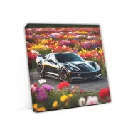 Black Chevrolet Corvette Stingray Amidst Flowers - Bold Elegance