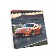 Nissan 170Z Orange on Track - Speed and Style Captured