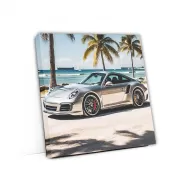 Silver Porsche 911 at Beach - Icon of Speed and Elegance
