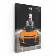 Vibrant Orange Chevrolet Camaro at Fuel Stop - Iconic Power