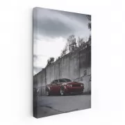 Red Dodge by Concrete Wall - Bold and Powerful Design