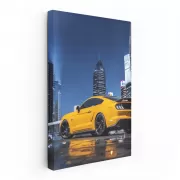 Yellow Mustang in Nighttime Cityscape - Bold and Powerful