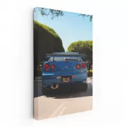 Nissan GT-R R34 Navigates Tight City Roads - Iconic Speedster