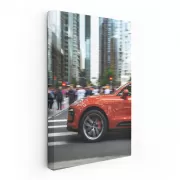 Vibrant Orange Porsche Macan S with Skyscrapers - Bold Elegance