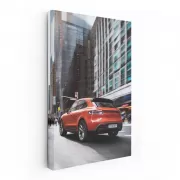 Porsche Macan S in Orange with Skyscraper Backdrop - Dynamic Power