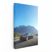 Snowy Mountain Black Cadillac - Elegance in Motion