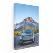 Black Cadillac in Snowy Mountains - Power and Elegance