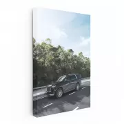 Sleek Black Cadillac Cruising Highway - Pure Luxury