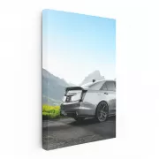 Cadillac in Gray Before Snowy Peaks - Elegant Powerhouse