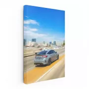 Honda Civic Driving with Urban Backdrop - Sleek and Reliable